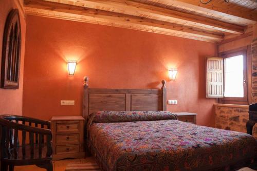 En eller flere senge i et værelse på La Carcaña