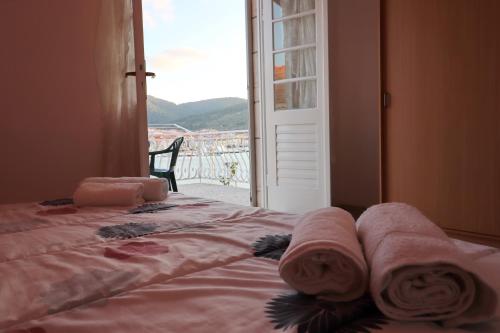 Ένα ή περισσότερα κρεβάτια σε δωμάτιο στο Seaside Apartment Franica