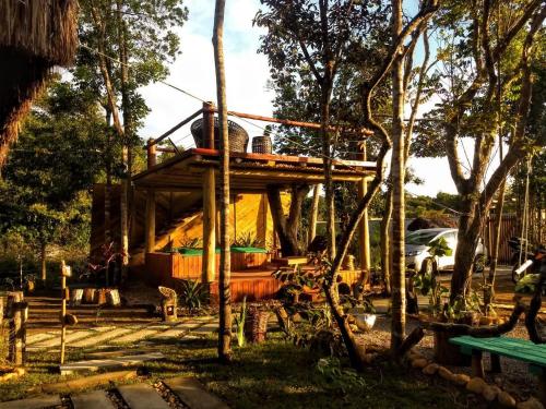 a tree house in the middle of a forest at 4 Elementos Guest House in Arraial d'Ajuda