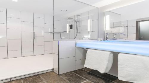 Ванная комната в Holiday Inn Hamburg - City Nord by IHG