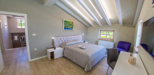 Katil atau katil-katil dalam bilik di Villa VAND Paradiso