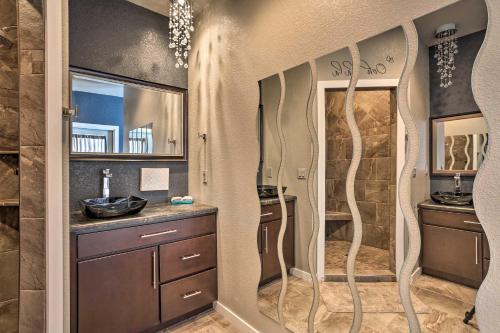 a bathroom with a walk in shower and a sink at Hakuna Matata Cabin - 11 Mi to Mt Rushmore! in Hill City