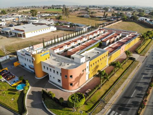 an overhead view of a building in a city at HOTEL CASTELO in San Juan del Río