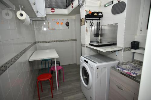 A kitchen or kitchenette at Diana Guest House