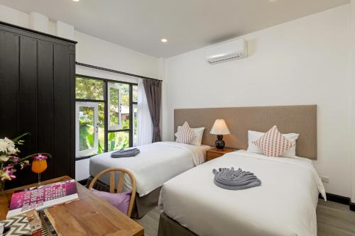 Postel nebo postele na pokoji v ubytování Patong Garden House - Luxury Villa in Patong Hills