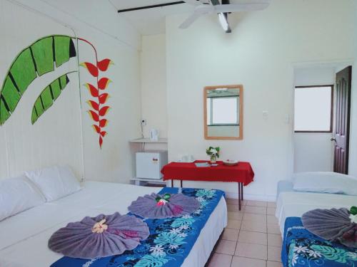 Tempat tidur dalam kamar di Olivias Accommodation