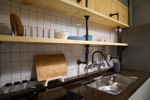 A kitchen or kitchenette at Apollo Guesthouse