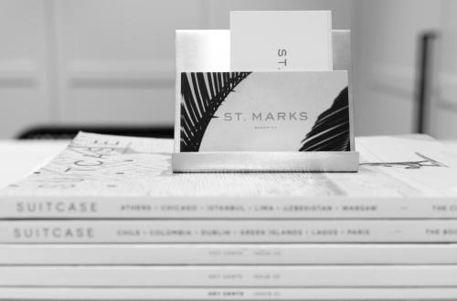 a stack of st marks books sitting on a table at St Marks Randwick in Sydney