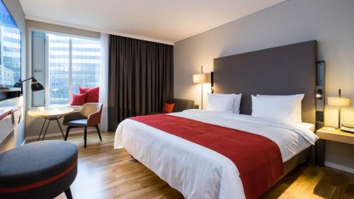 Кровать или кровати в номере Holiday Inn Hamburg - City Nord by IHG