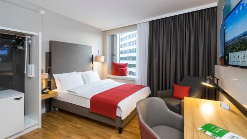 Телевизор и/или развлекательный центр в Holiday Inn Hamburg - City Nord by IHG