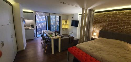 Ένα ή περισσότερα κρεβάτια σε δωμάτιο στο Small cozy apartment in the historic center