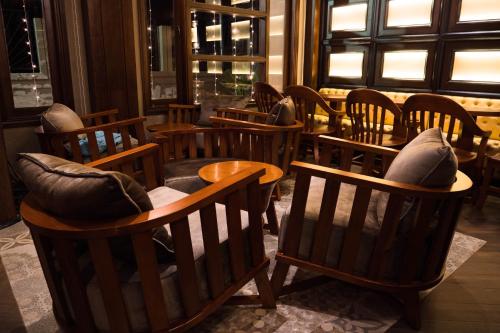 a row of chairs and tables in a restaurant at Sea Shell Resort & Spa, Havelock in Havelock Island