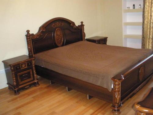 Postel nebo postele na pokoji v ubytování Gocha's apartaments