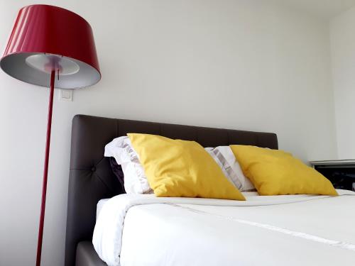 Katil atau katil-katil dalam bilik di Appart'Hôtel Luxapparts