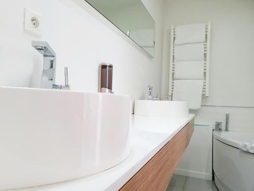 Bilik mandi di Appart'Hôtel Luxapparts