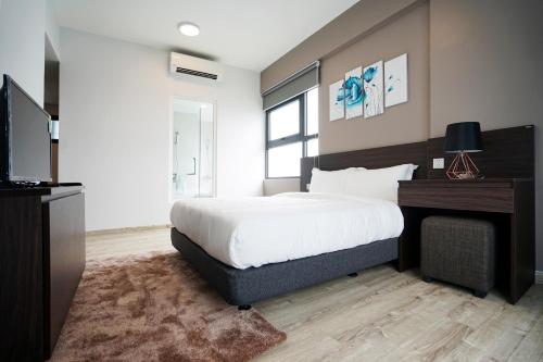 Postel nebo postele na pokoji v ubytování The First Stay Hotel