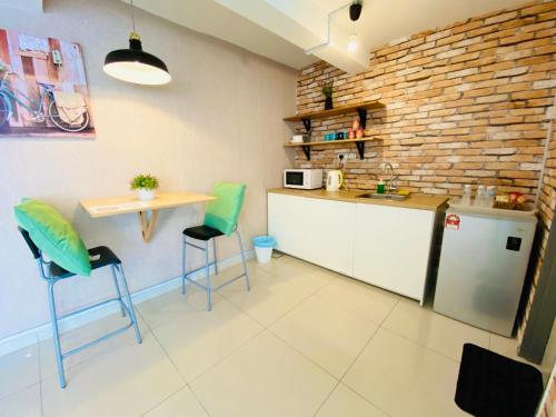 Kuchyň nebo kuchyňský kout v ubytování Chrisenbel Suites - Pinnacle PJ