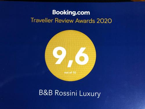 a yellow circle with the number on it at B&B Rossini Luxury 2 in Cosenza