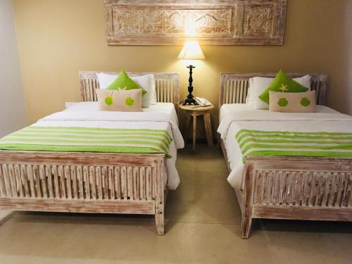 Katil atau katil-katil dalam bilik di The Beach Boutique
