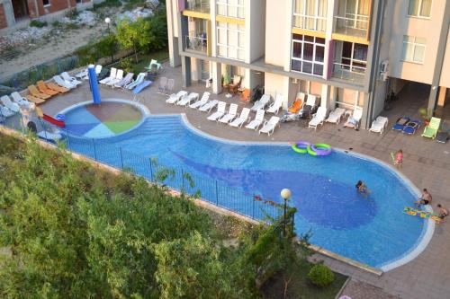 Swimmingpoolen hos eller tæt på Sun City Apartments