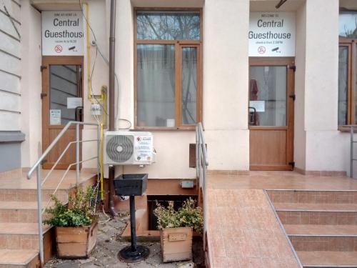 a building with a speaker on the outside of it at Central Guesthouse in Bucharest