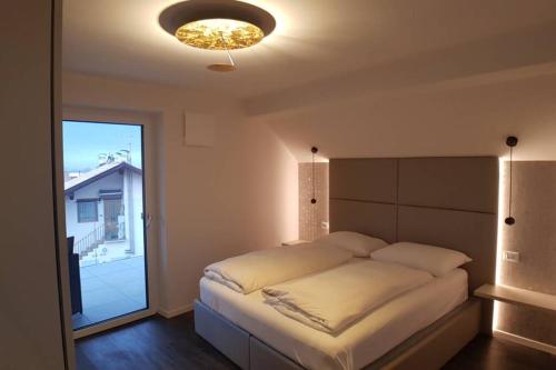 Postel nebo postele na pokoji v ubytování Gardenpark Loft