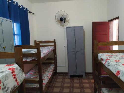 Кровать или кровати в номере Hostel My Place Hospedaria