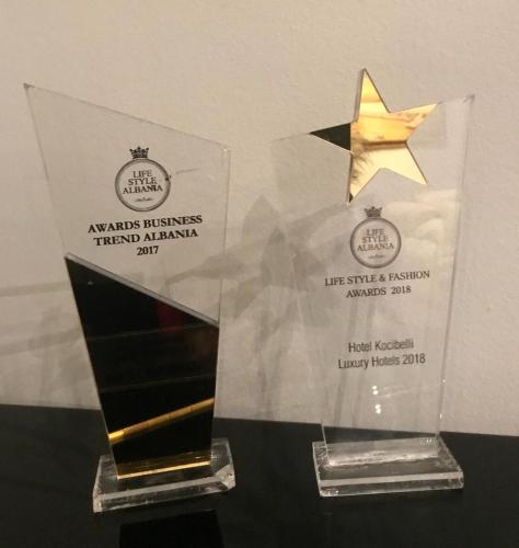 a trophy with a star on top of a table at Hotel Kocibelli POOL & SPA in Korçë
