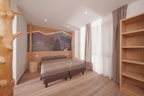 Postel nebo postele na pokoji v ubytování Agriturismo Hegemone