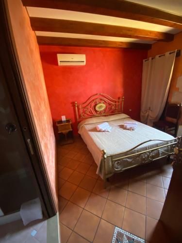 Una cama o camas en una habitación de B&B L'Infiorescenza new