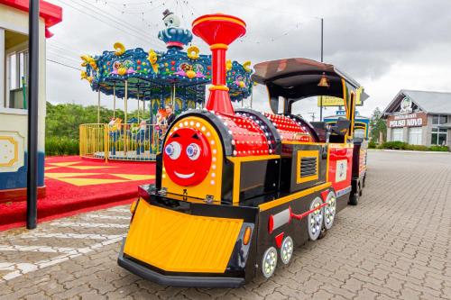 a small train on a merry go roundousel at ibis Igrejinha in Igrejinha