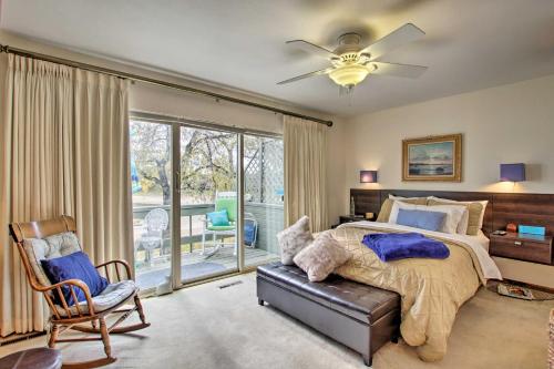 a bedroom with a bed and a ceiling fan at Lakefront Fort Collins Townhome, Only 3 Mi to CSU! in Fort Collins