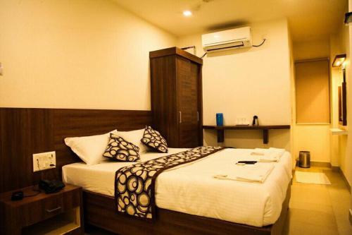 מיטה או מיטות בחדר ב-Hotel Delma