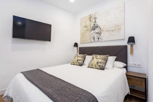 Postel nebo postele na pokoji v ubytování Callao Flat
