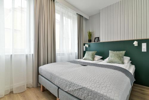 Posteľ alebo postele v izbe v ubytovaní Old Town LTC - Apartments Starówka Tobiasza