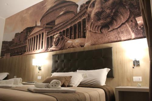 Ένα ή περισσότερα κρεβάτια σε δωμάτιο στο Dante Relais
