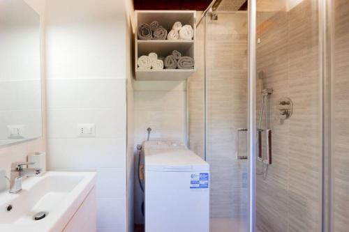 a small bathroom with a shower and a sink at Authentic Villa Surrounded by Nature in Terni