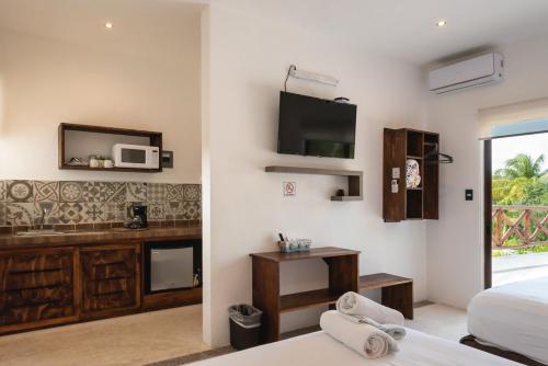 Kuchyň nebo kuchyňský kout v ubytování Villas Palmar Holbox