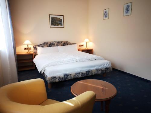 Katil atau katil-katil dalam bilik di LandhotelUllrich