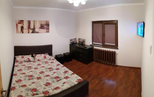 A bed or beds in a room at Apartament La Malul Marii-Plaja DIANA