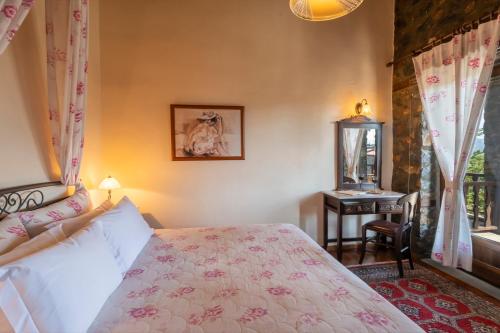 Letto o letti in una camera di ROUGA Mountain Boutique Suites & Spa