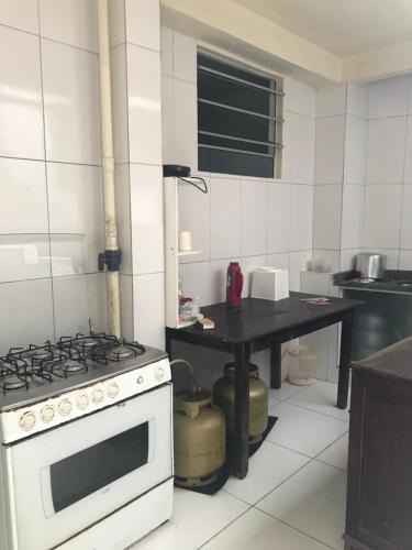 Kuchyň nebo kuchyňský kout v ubytování Pousadinha- Melhor Localização