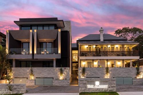 a rendering of a house with a sunset in the background at The Albert Mosman in Sydney