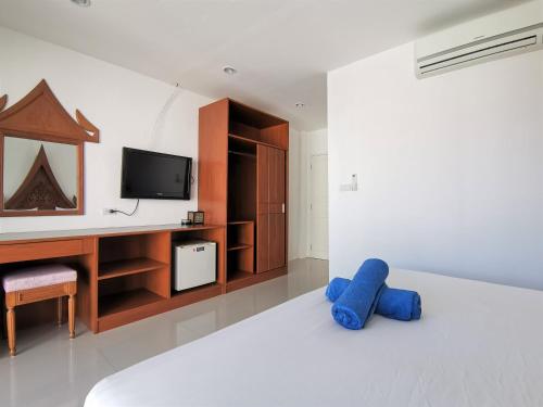 Кровать или кровати в номере Sure Guesthouse