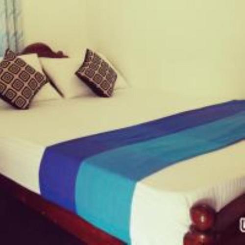Cama o camas de una habitación en Umesh Homestay Dambulla
