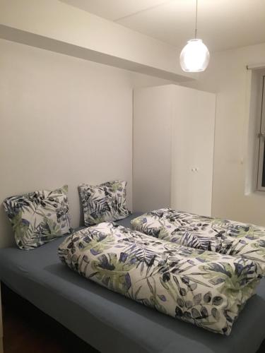 Postel nebo postele na pokoji v ubytování EDEL city apartment