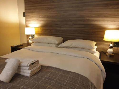 A bed or beds in a room at Andaluz Boutique Hotel