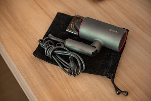 a blow dryer sitting on top of a table at Nap in Chiangmai in Chiang Mai