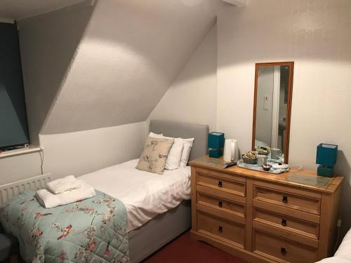 מיטה או מיטות בחדר ב-Winchester House