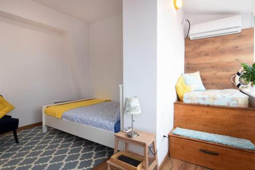 Krevet ili kreveti u jedinici u okviru objekta Travel and Discover @ Smart Stay Near Metro